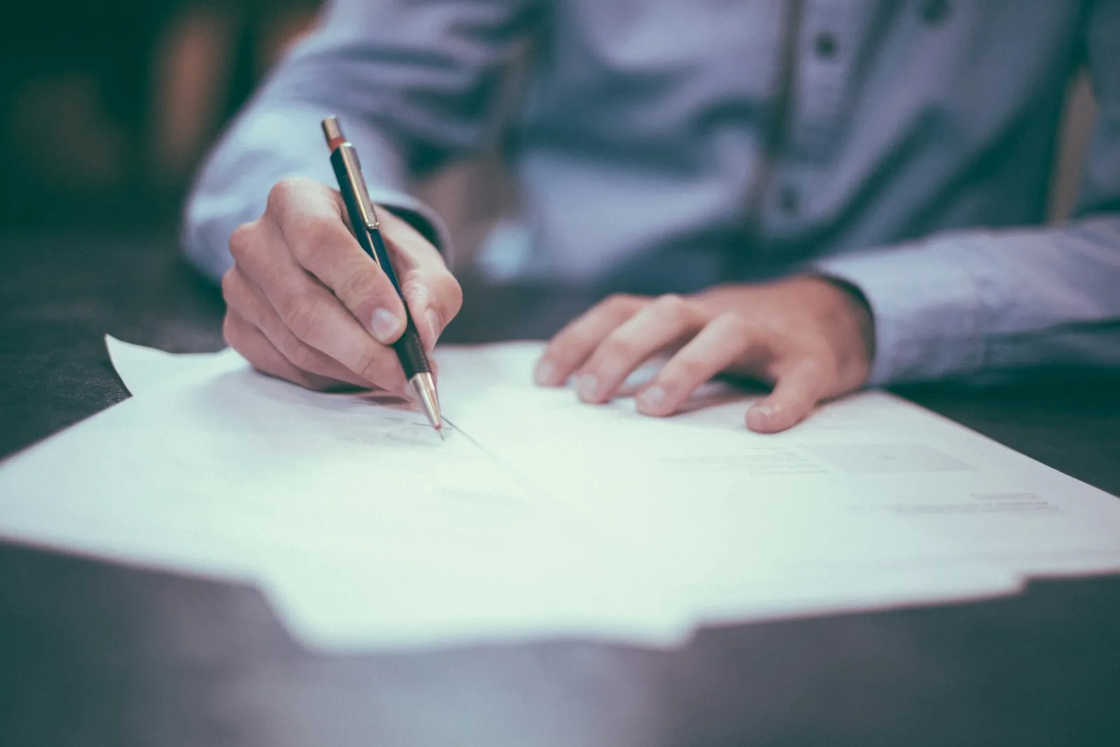 Signing legal property documents with a fountain pen