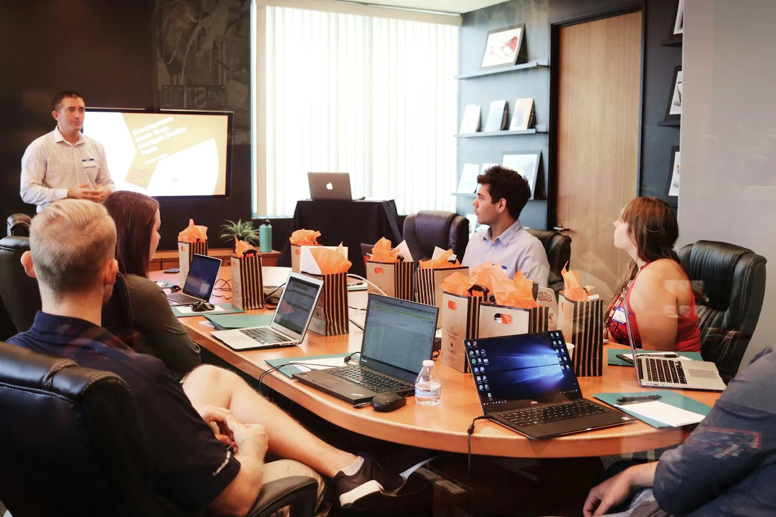 Trainer presenting to a team during a workplace training session